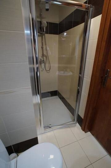 Фото номера Четырехместный номер Проживание в семье Apartamenty Ostrowiec - Pokoje Gościnne Centrum г. Островец-Свентокшиский 2