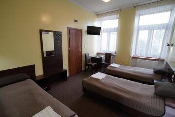 Фото номера Трехместный номер Проживание в семье Apartamenty Ostrowiec - Pokoje Gościnne Centrum г. Островец-Свентокшиский 10
